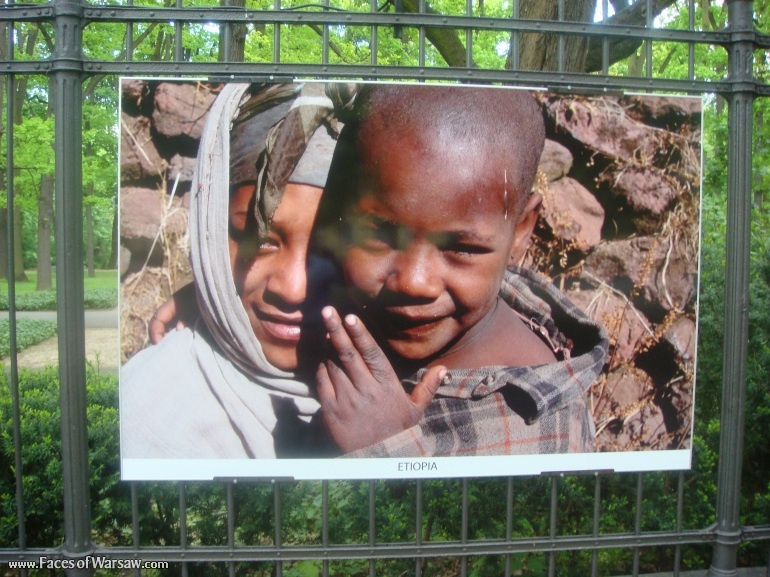 Faces of Warsaw - "Smile of the World" Photo Exhibition - Łazienki fencing